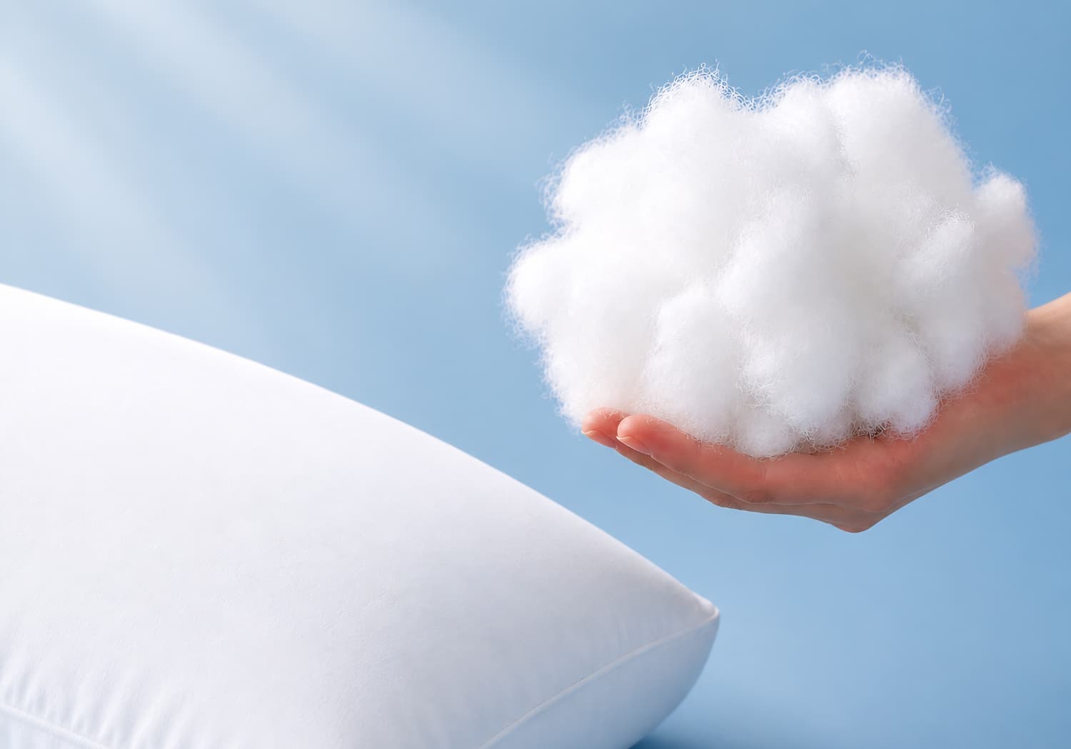 Soft snuggL fill floating beside a pillow